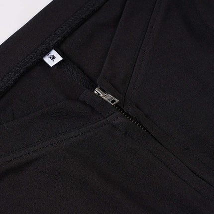 Close-up of the zipper detail on Grozavu Low-Waist Flared Leggings – Slim Fit, showcasing quality fabric and design.