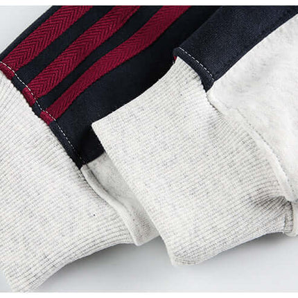 Detail of sleeves from the National Trend Retro Stripe Loose Shirt showcasing unique stripe design and fabric texture.