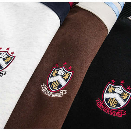 National Trend Retro Stripe Loose Shirt - close-up of embroidered designs on striped shirts in various colors