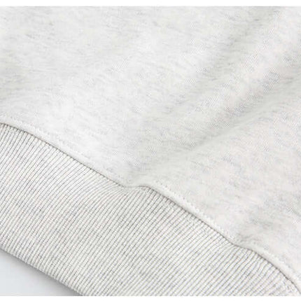 Close-up of the fabric and cuff detail of the National Trend Retro Stripe Loose Shirt in soft cotton blend.