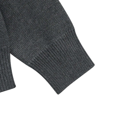 Notch Lapel Knit Sweater - Loose Fit sleeve detail showcasing ribbed cuff and smooth texture.