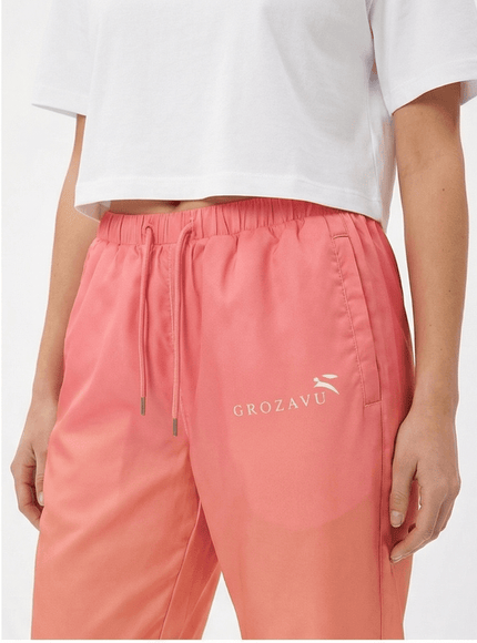 Back view of relaxed track trousers by Grozavu