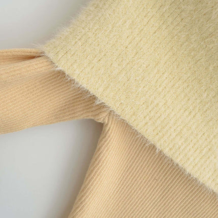 Close-up of fabric texture on the One Shoulder Long Sleeve Office Casual Top in beige and cream color.
