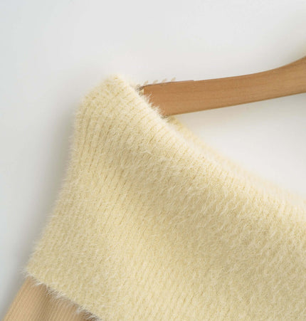 Close-up of the neckline of the One Shoulder Long Sleeve Office Casual Top, showcasing its soft yellow fabric.