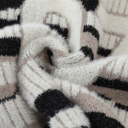 One-Shoulder Striped Knit Sweater – Slim Fit fabric close-up showing texture and bold stripe patterns.