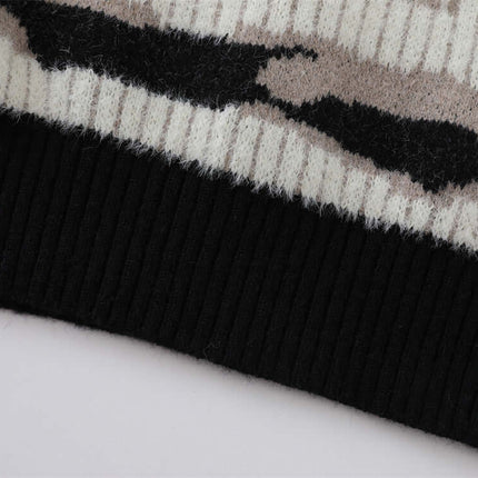 One-Shoulder Striped Knit Sweater – Slim Fit close-up of ribbed hem showing bold stripe patterns and soft texture.