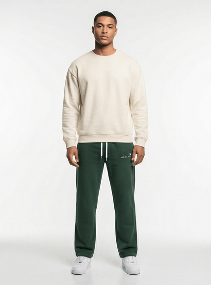 Model wearing wide leg joggers by Grozavu