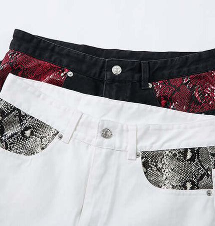 Patchwork Straight Jeans – Loose Fit showcasing unique snake pattern spliced denim pockets in black and white.