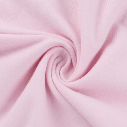 Close-up of smooth pink fabric showcasing lightweight material for Cross Print Crop TShirt - Slim Fit.