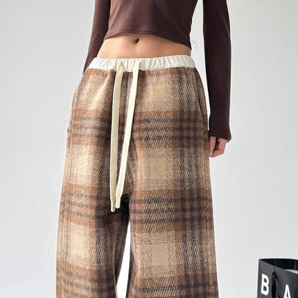 Plaid Flannel Fleece Lined Winter Pants featuring a relaxed fit and stylish design, perfect for colder seasons.