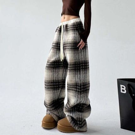 Plaid Flannel Fleece Lined Winter Pants model wearing stylish winter outfit with plaid pattern and fleece lining.
