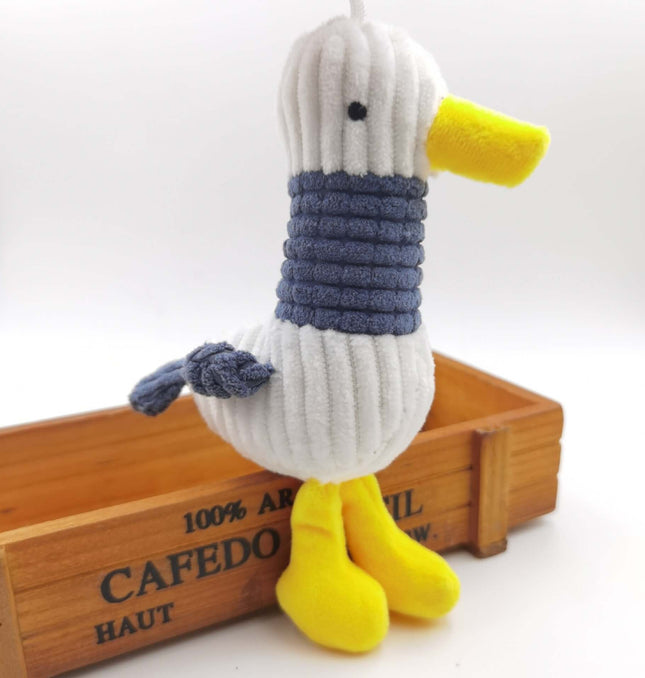 Plush Seagull Doll Bag Pendant Keychain in playful cartoon style with yellow feet and blue features.