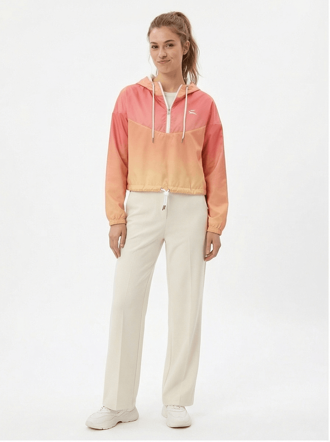 Model wearing cropped windbreaker by Grozavu