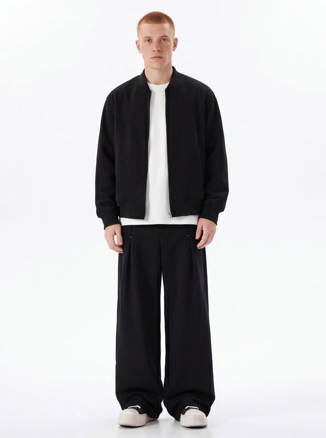 Model wearing Black cleanfit street trousers by Grozavu