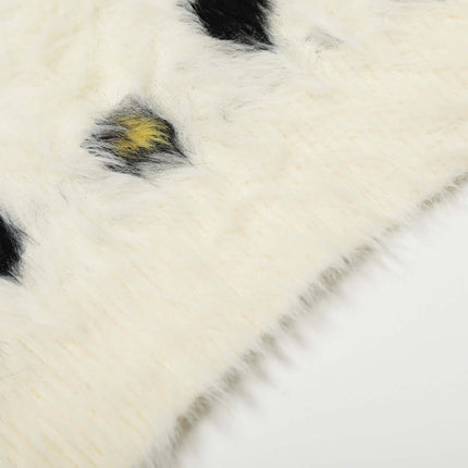 Regular Fit Animal Print Fleece Sweater close-up showcasing soft fleece texture and unique animal print details.