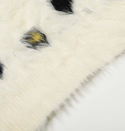 Regular Fit Animal Print Fleece Sweater close-up showcasing soft fleece texture and unique animal print details.