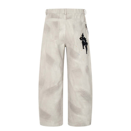 Jeans in denim a gamba dritta con toppe