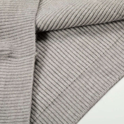 Close-up of the fabric texture of a Retro Cardigan Sweater - Loose Fit in soft gray knit.