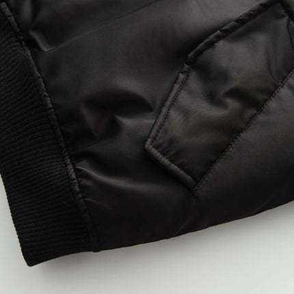 Close-up of the sleeve detail on the Retro Flight Jacket – Oversized, showcasing its durable fabric and stylish design.