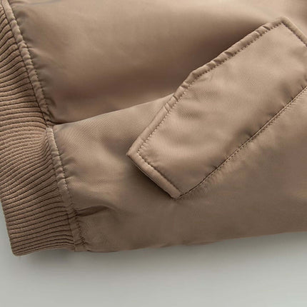 Close-up of sleeve detail on the Retro Flight Jacket – Oversized in beige, showcasing fabric and pocket design.