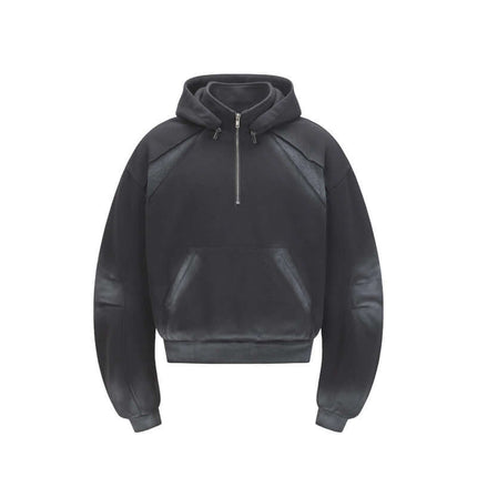 Patchwork Half-Zip Hoodie in black featuring a half-zip high-neck design for modern streetwear style.