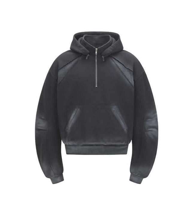 Patchwork Half-Zip Hoodie in black featuring a half-zip high-neck design for modern streetwear style.