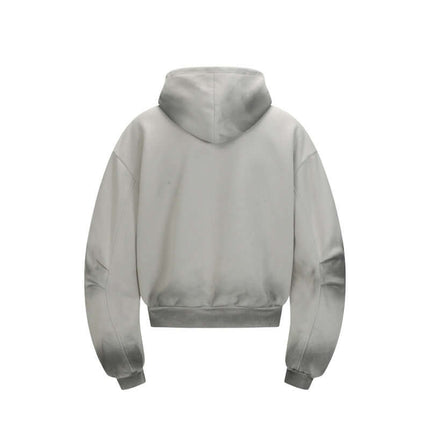 Back view of a Patchwork Half-Zip Hoodie showcasing its stylish design and casual fit.