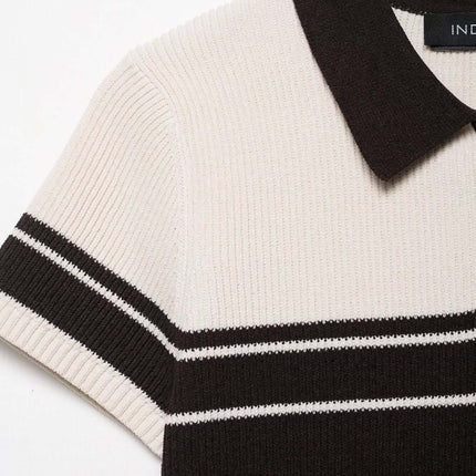 Ribbed Stripe Knit Polo Shirt – Loose Fit showcasing ribbed texture and stylish collar in white and black color.