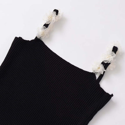 Round Neck Flower Knit Top – Sleeveless detail featuring flower straps and soft texture.