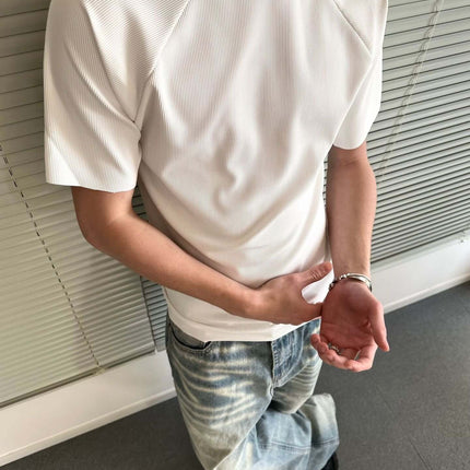 Seamless Jacquard TShirt – Loose Fit in white, showcasing a modern athletic style and relaxed fit.