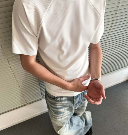 Seamless Jacquard TShirt – Loose Fit in white, showcasing a modern athletic style and relaxed fit.