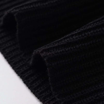 Close-up of the texture of the Round Neck Flower Knit Top – Sleeveless fabric showcasing its knitted pattern.