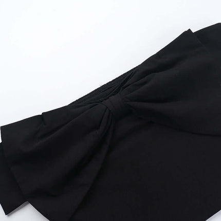 Close-up of the bow detail on the Slim Fit One-Shoulder Bow Top, highlighting its elegant design.