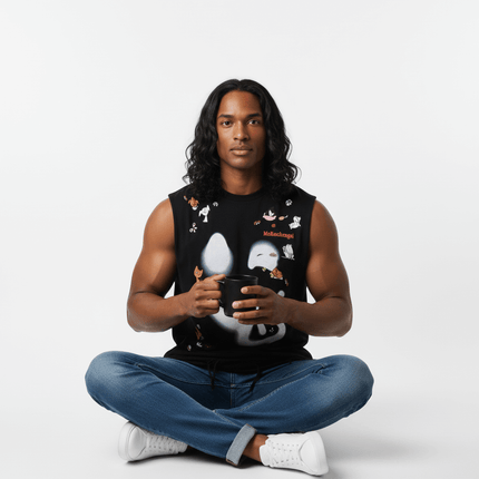 Smiley Graffiti Print Sleeveless Tank Top worn by a model sitting cross-legged, holding a black mug.