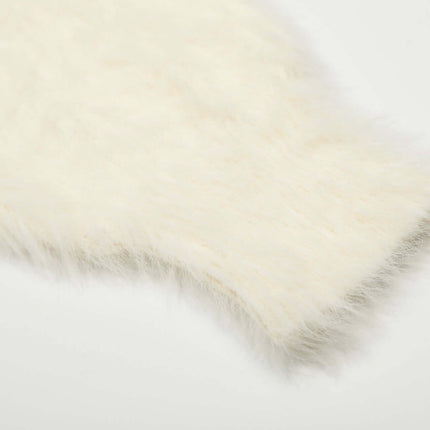 Soft fleece texture of the Regular Fit Animal Print Fleece Sweater in ice cream color, showcasing coziness and style.