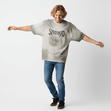 Patch Embroidery TShirt – Loose Fit worn by man in a relaxed stance, showcasing oversized design and casual street style.