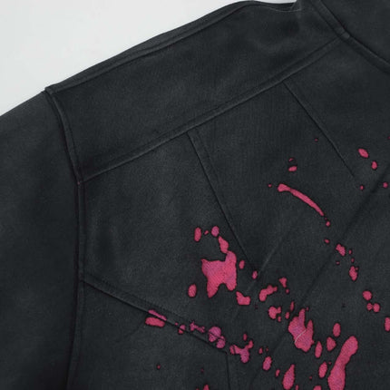 Splashing Ink Spliced Hooded Sweatshirt showcasing vibrant splashing ink design on the shoulder.