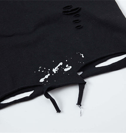 Close-up of the Splatter Ink Tank Top – Loose Fit showing paint splatter detail and distressed fabric design.