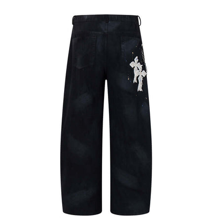 Straight Leg Patchwork Denim Jeans with artistic cross patch embroidery and hand-painted detailing on the back.