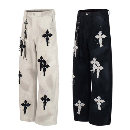 Straight Leg Patchwork Denim Jeans featuring cross patch embroidery and color splatter detailing.