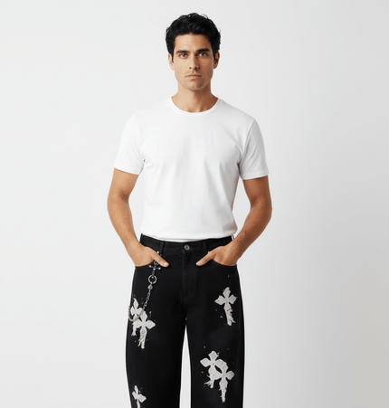 Straight Leg Patchwork Denim Jeans worn by a model with a white t-shirt, showcasing bold embroidery and artistic design.