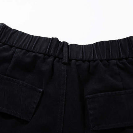 Pantalons en denim cargo imprimés graffiti