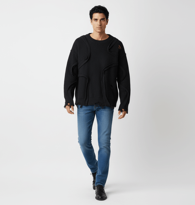 Stylish model wearing the Street Tide Thick Knit Sweater – Loose Fit with blue jeans.