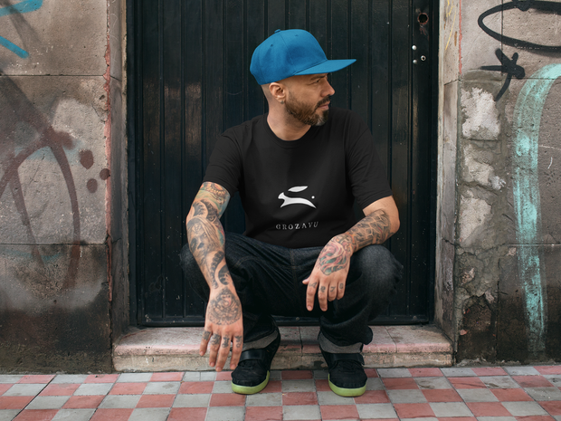Group of models showcasing streetwear outfits in city backdrop