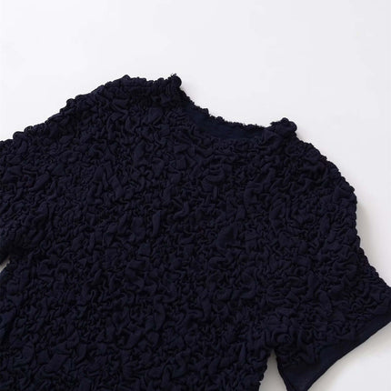Texture Knitted Bow Round Neck Top in navy with a textured fabric and round neckline, showcasing its elegant design.