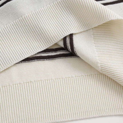 Turn-Down Collar Stripe Sweater showing high-quality knit fabric with bold stripe detailing and relaxed fit.