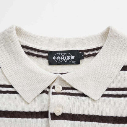 Turn-Down Collar Stripe Sweater with soft knit fabric and bold stripe detailing.