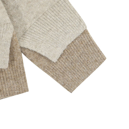 Two-Piece Style Knit Sweater – Loose Fit showing detailed cuffs and texture of the knit fabric.