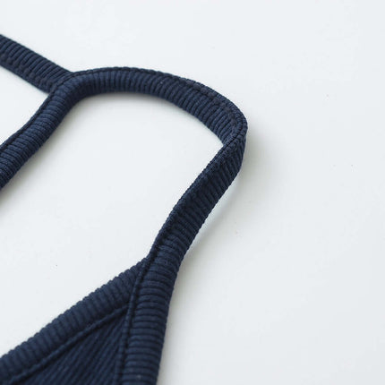 Detail of the UNeck Crop Tank Top – Slim Fit, showcasing the stylish straps and fabric texture.