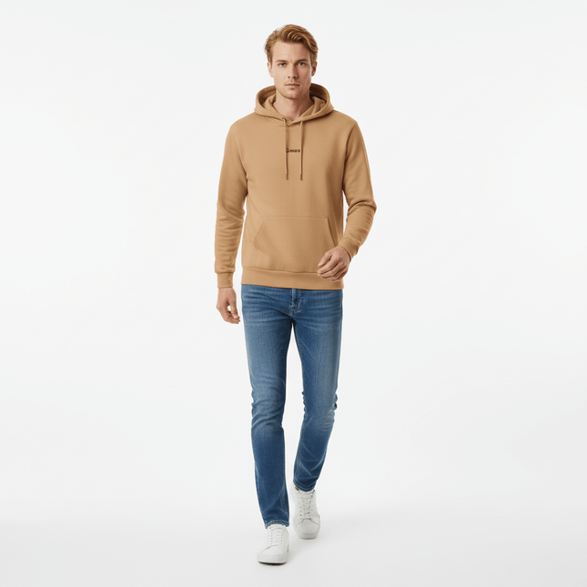 Urban Garment Dyed Hoodie – Loose Fit shown on a model walking, paired with jeans and sneakers.